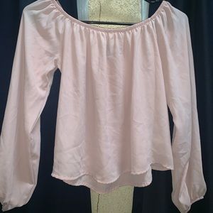 Off the shoulder simi see through top.